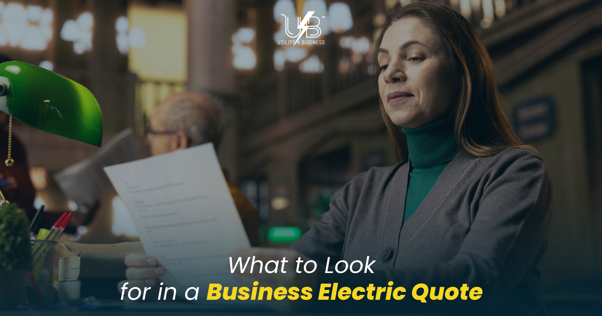UK business electricity comparison; reviewing a Business Electric Quote, rates, and contract terms at desk.